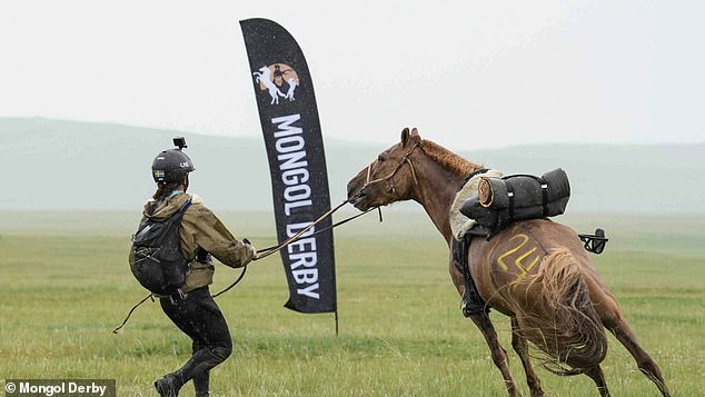 Riders ride across the Mongolian steppe on 'semi-wild' horses during the nine-day race