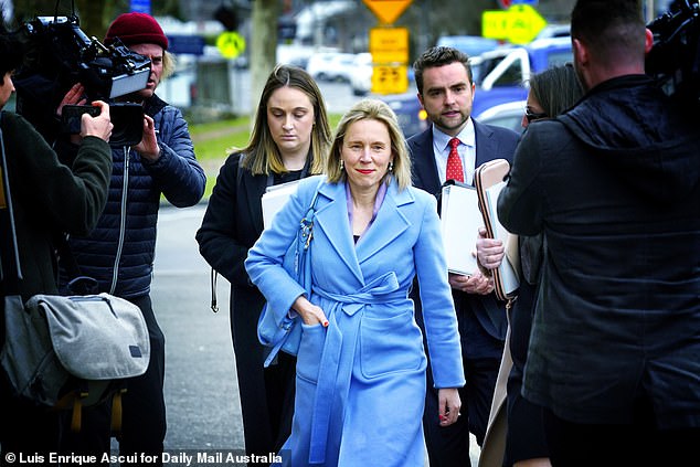 Stephenson's lawyer Moya O'Brien (centre) refused to answer questions as he left Ballarat District Court on Thursday