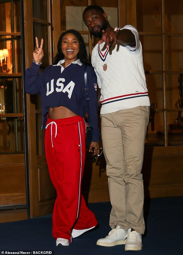 Union wore a short blue American rugby shirt that highlighted her toned tummy with red tracksuit bottoms with blue and white stripes