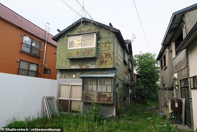 There are now more and more abandoned houses in Japan in cities and built-up areas, mainly due to the country's aging population (pictured Akiya in Hokkaido Prefecture)