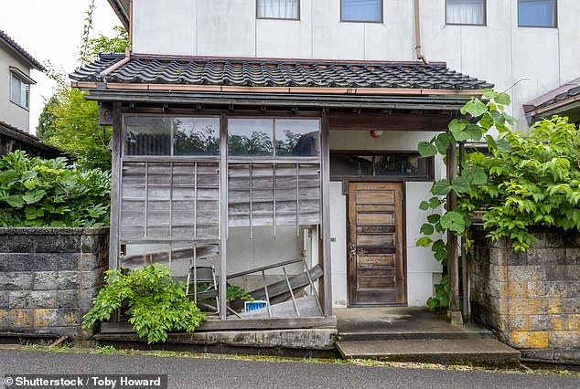 Aussies are allowed to buy in Japan, but can't get a mortgage. Foreign buyers are warned to do their research, as there may be restrictions. Older homes are also more susceptible to earthquake damage (pictured, an abandoned house in Ishikawa)