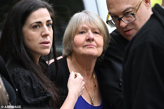 Amorosi sued mother Joyleen Robinson (centre) in the Supreme Court of Victoria (James Ross/AAP PHOTOS)