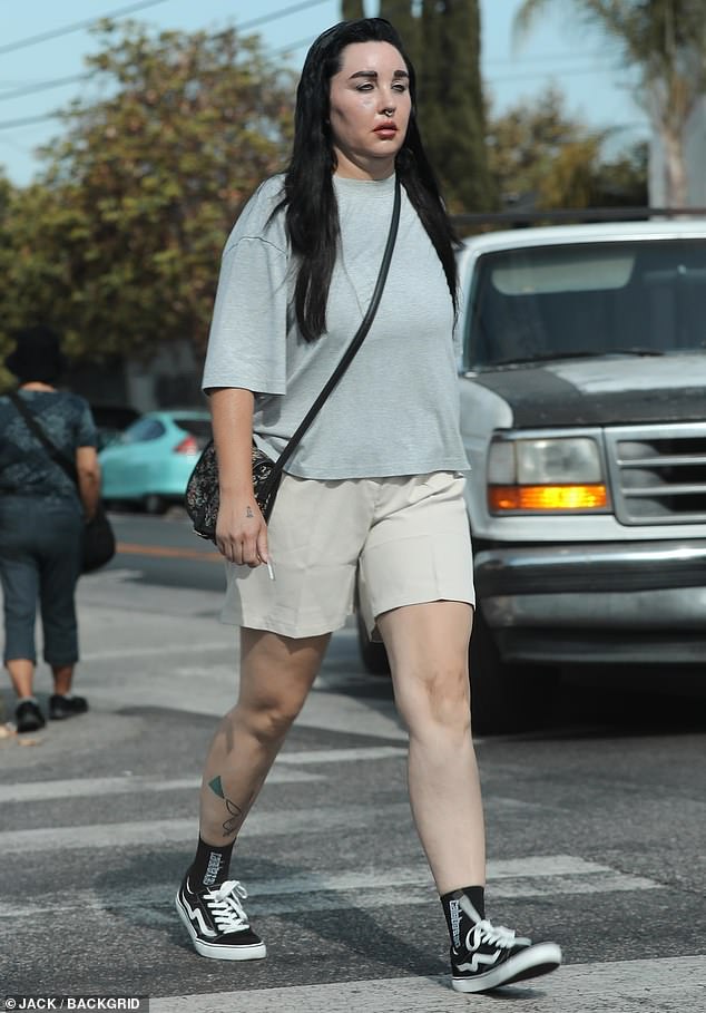 Bynes kept it casual for the outing in an oversized gray T-shirt, which she paired with khaki shorts