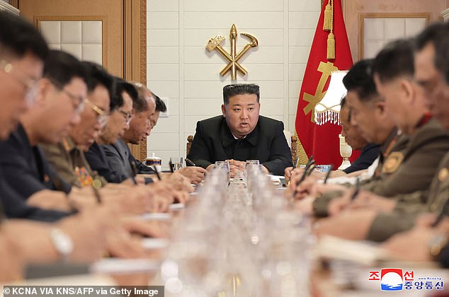 North Korea's leader Kim Jong Un holds an emergency meeting to discuss flood recovery measures in North Korea.