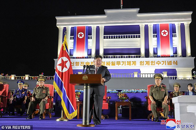 Kim Jong Un attends a ceremonial event marking the delivery of new tactical ballistic missiles on August 4