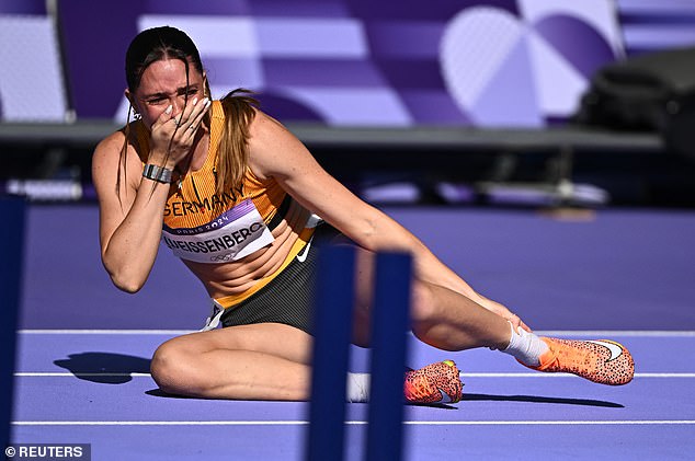 The German heptathlete fell to the ground in pain after suffering the problem during her warm-up