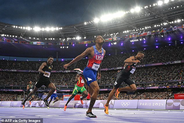 Quincy Hall sneaked past Hudson-Smith before the finish line to take the gold medal for the US