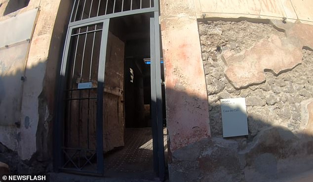 The entrance to the old villa, a popular spot for tourists visiting the site