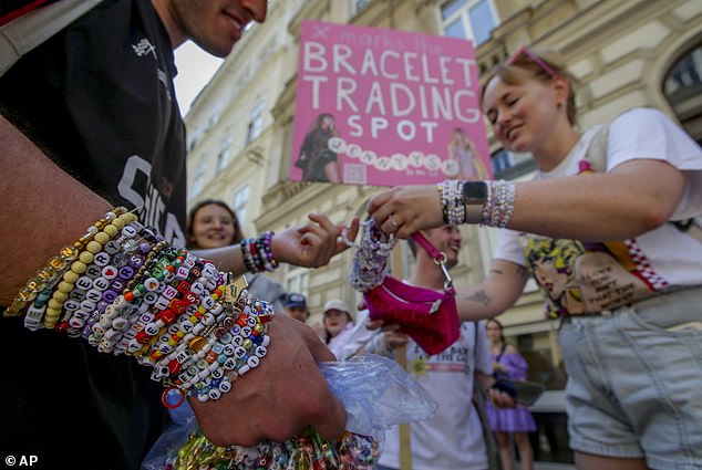 Swifties exchange bracelets in Vienna city centre