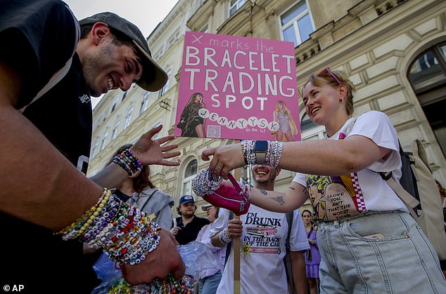 Swifties exchange bracelets in Vienna city centre