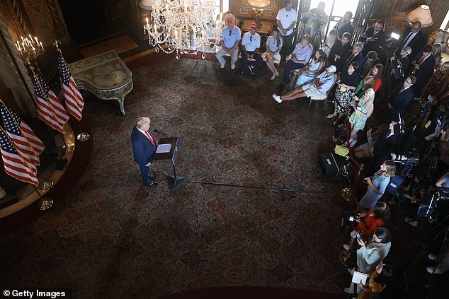 Donald Trump speaks to reporters at Mar-a-Lago