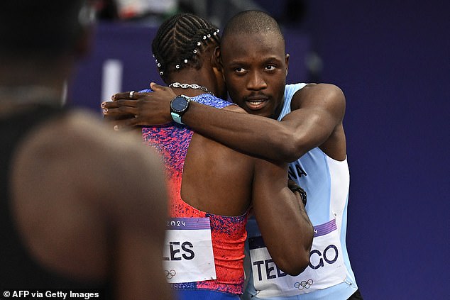 But the American star was seen hugging gold medalist Letsile Tebogo before turning heads