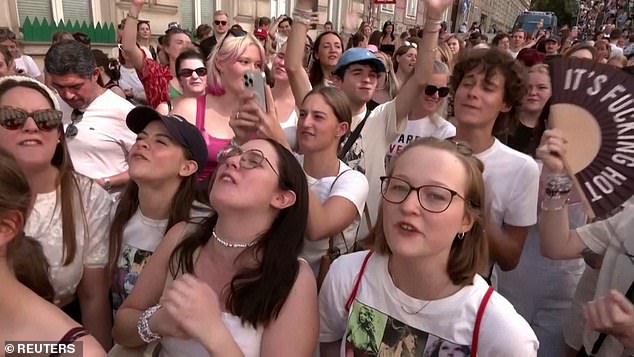 Taylor, 34, announced Wednesday that her three concerts in Vienna were canceled after officials discovered an ISIS terror plot. Taylor fans are seen in Vienna