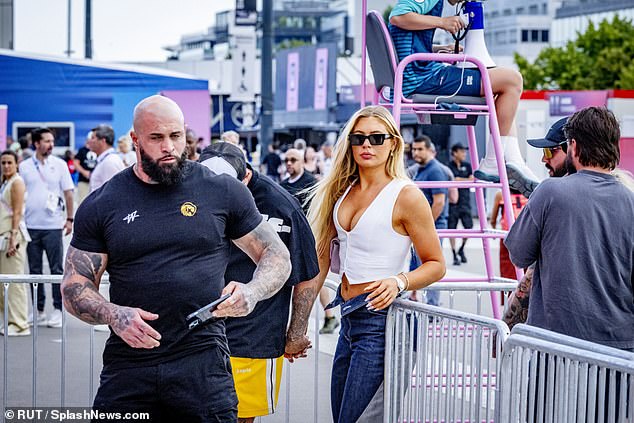 The Dutch skater wore black sunglasses and a low-cut white top to the Stade de France