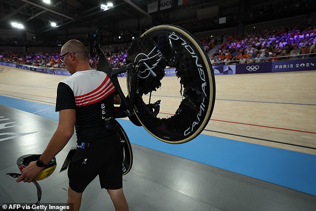 The bicycle of the Belgian Degrendele is taken away, with the rear wheel destroyed