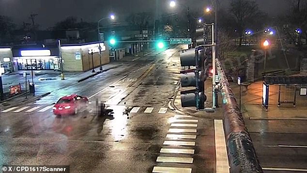 Traffic camera footage shows the horrific moment the pair collided at the intersection, with the motorcyclist being thrown violently from the passenger side of the car and his bike disintegrating