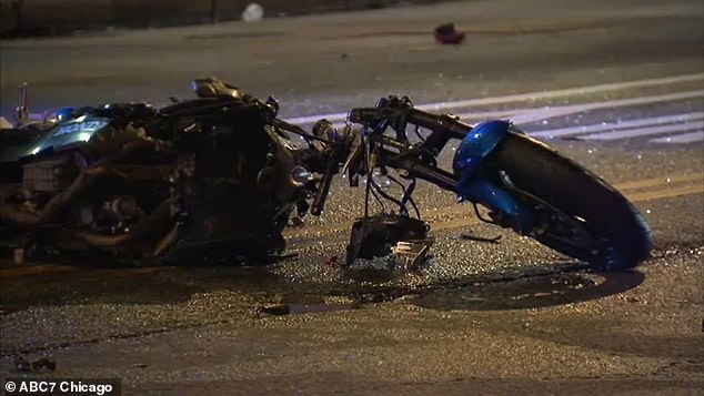 A lone police officer was later seen cautiously approaching the motorcyclist with a flashlight and removing what appeared to be a firearm from the man's body, placing it several meters away from the deceased man.