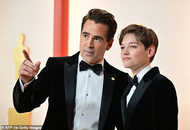 He explained: 'If James had been my second child and not my first, I would have known sooner, because when Henry was born and I heard him cooing, I thought: "Should a baby coo?"'; seen with younger son Henry, 15, in 2023