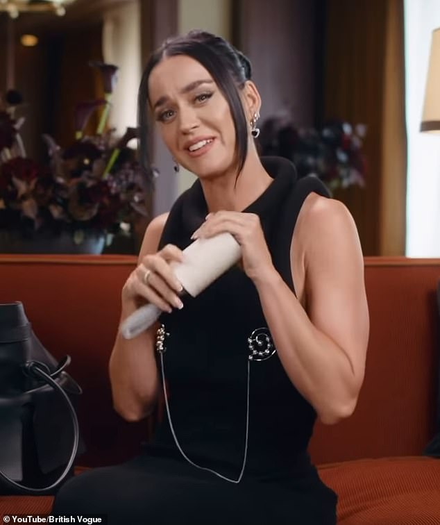 “I swear by my lint roller,” she declared after pulling it out and running it over her tight-fitting black dress