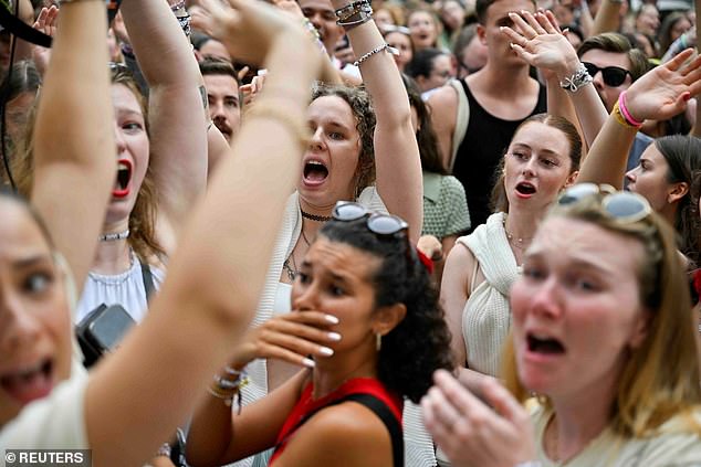 Fans of singer Taylor Swift gather after the cancellation of three Taylor Swift concerts at the Happel Stadium after authorities confirmed a planned attack on the venue in Vienna, Austria, August 8, 2024