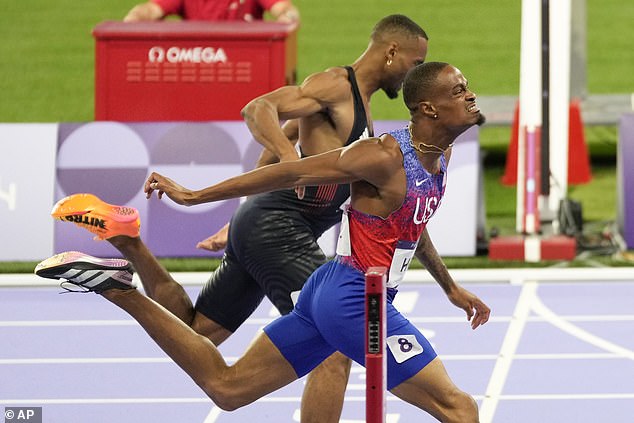 Hudson-Smith had to settle for silver in the men's 400 metres final after losing by the narrowest of margins to American Quincy Hall (right)