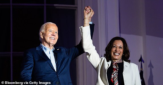 U.S. President Joe Biden, left, and Vice President Kamala Harris on the Truman Balcony of the White House in Washington, DC, U.S., Thursday, July 4, 2024. Biden's re-election campaign stumbled into U.S. Independence Day, exhausted by a week in which the incumbent president tried to maintain his grip on his party's nomination. Photograph: Tierney L. Cross/Bloomberg via Getty Images