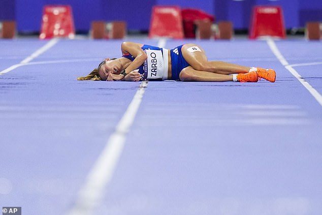 Zarbo falls on the track during the women's 10,000 meters at the 2024 Summer Olympics