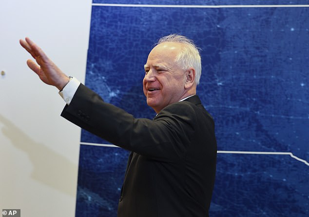 Minnesota Gov. Tim Walz greets reporters before Vice President Kamala Harris speaks at Planned Parenthood, March 14, 2024