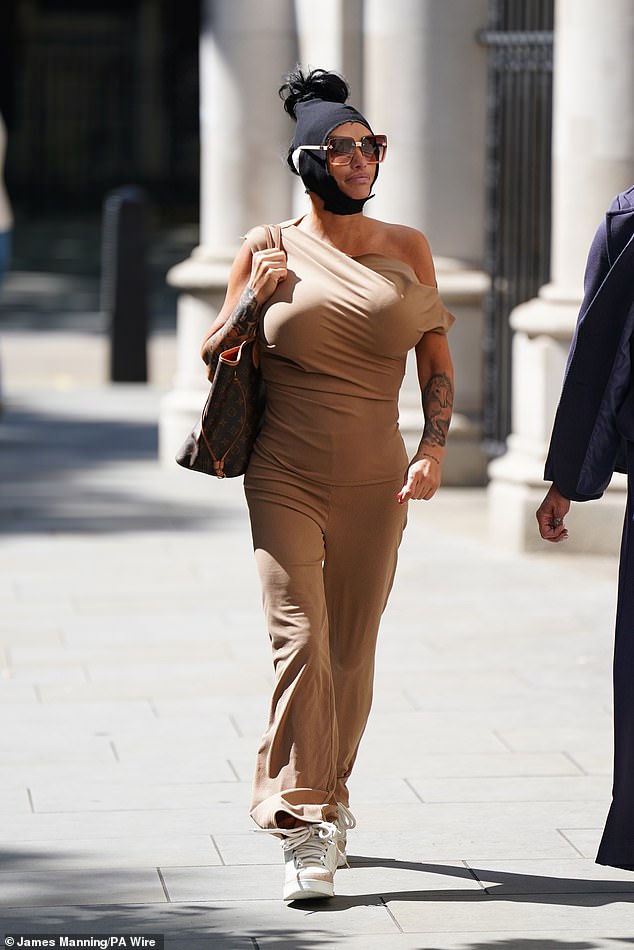 Her court appearance comes after a judge issued a warrant for her arrest after she failed to appear at a hearing regarding her massive £760,000 debt.