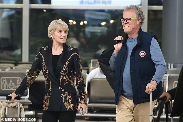 The lovebirds had big smiles on their faces as they flew into Sydney