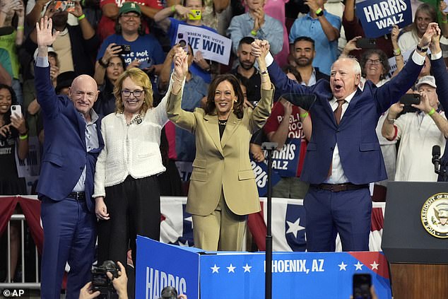 Harris was introduced by her running mate Tim Walz (right) and Arizona Senator Mark Kelly (left, with his former congresswoman wife Gabby Giffords)