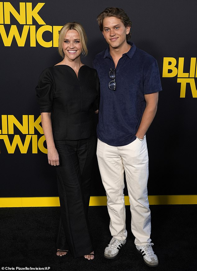 Reese looked sensational in a black dress, while Deacon kept it clean in a crinkled velvet polo and Adidas sneakers