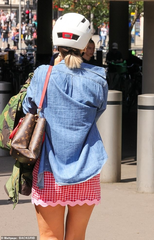 The star also held a designer bag as she strolled through the capital