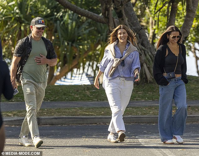 He completed his relaxed look with a salt-and-pepper beard and beamed as he chatted with Luciana and Lauren as he strolled down the street