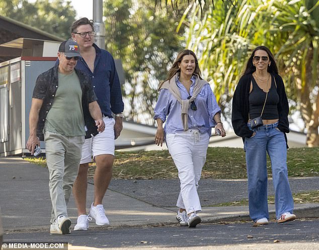 The couple were joined by their Australian friends, Nova radio star Phillips, who looked chic in a colorful ensemble, and her entrepreneur husband, Paul O'Brien