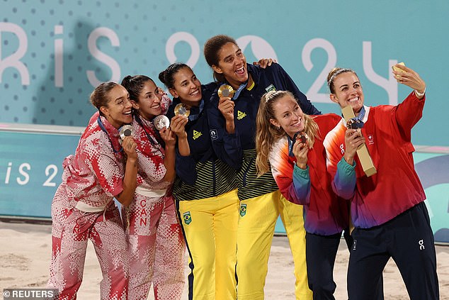 The good atmosphere between Canada and Brazil continued as they received their medals