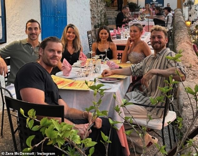 The couple are joined by the I'm A Celeb winner's sister Louise Thompson and her fiancé Ryan Libbey, with one photo showing them enjoying a dinner together in the sunshine