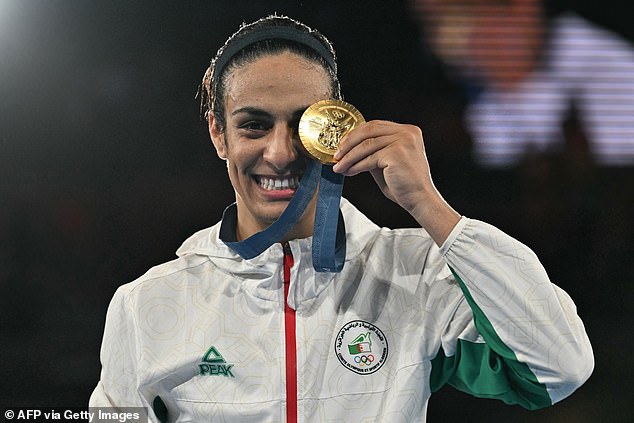 Imane Khelif celebrates her Olympic gold medal after intense criticism in Paris