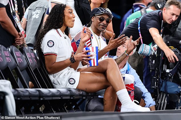 Snoop - real name Calvin Cordozar Broadus Jr. - appeared to be thoroughly enjoying the game, with the hitmaker seen clapping and cheering in support of the players