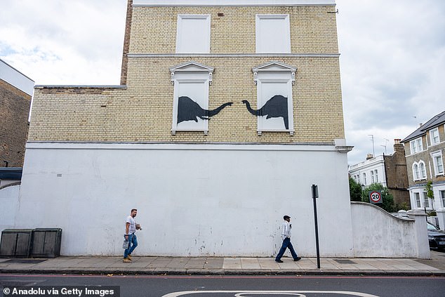 Elephants appeared in Chelsea, West London on Tuesday, unveiled by Banksy