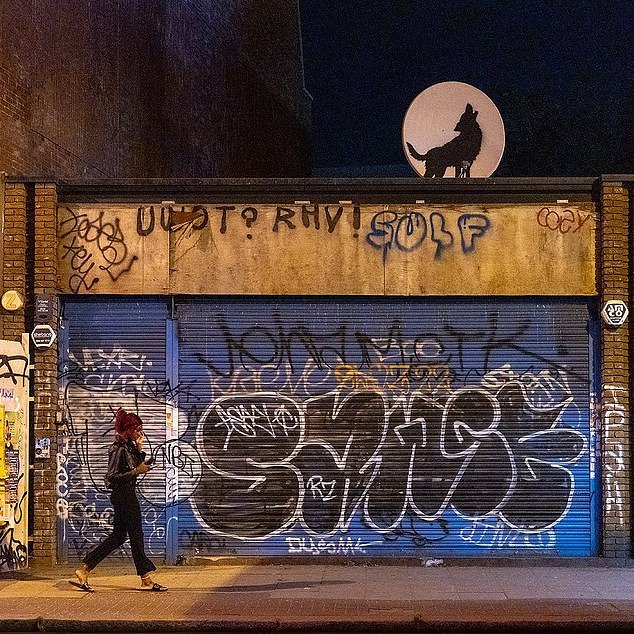 On Thursday, a wolf howling at the moon appeared on a satellite dish in Rye Lane