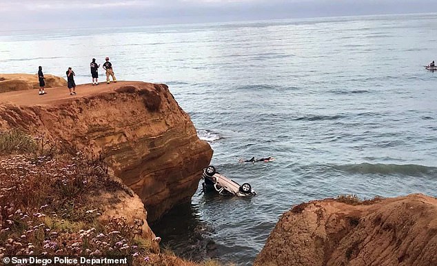 The car ended up upside down in the water after Brians drove it off the cliff