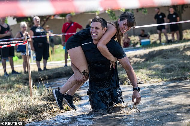 Participants will compete in a wife carrying championship in Tapiobicske, Hungary on Saturday