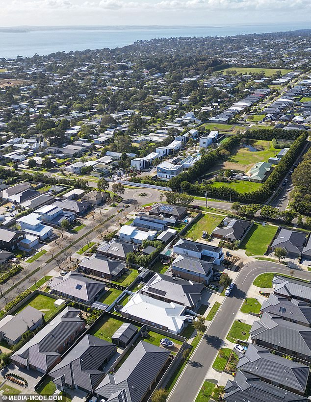 However, this 'pure paradise' is located in the middle of an emerging suburb, surrounded by modern buildings built according to a similar plan