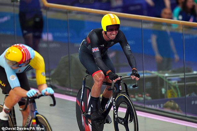 Wood (pictured) got back on his bike in the men's Madison final but appeared to be injured