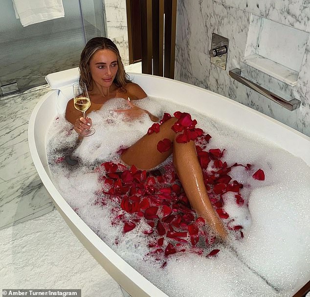 After staying at the top hotel Atlantis The Royal and being treated to a bouquet of 200 roses, a rose petal bath and champagne, Amber said she felt like the 'luckiest girl ever'