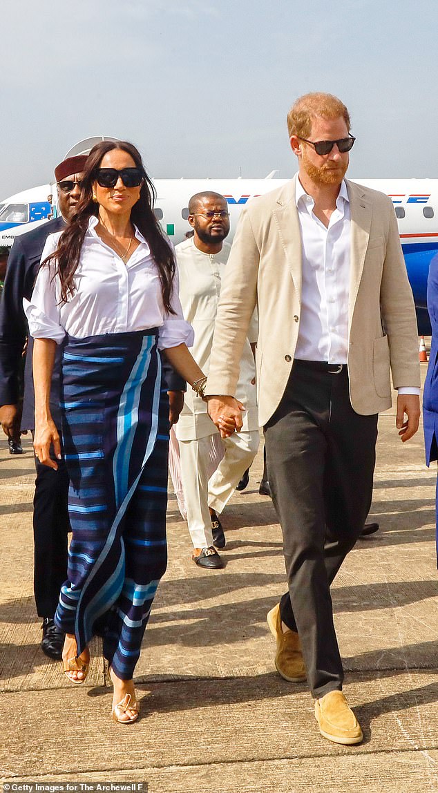 Harry and Meghan arrive at Lagos Airport on May 12, 2024 for the official state welcome in Lagos, Nigeria