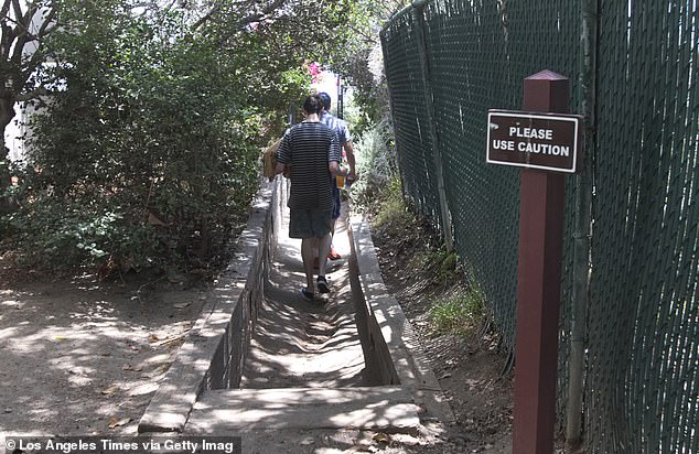 Beachgoers at the public access point to Lechuza Beach from Broad Beach Rd. in Malibu on June 29, 2014