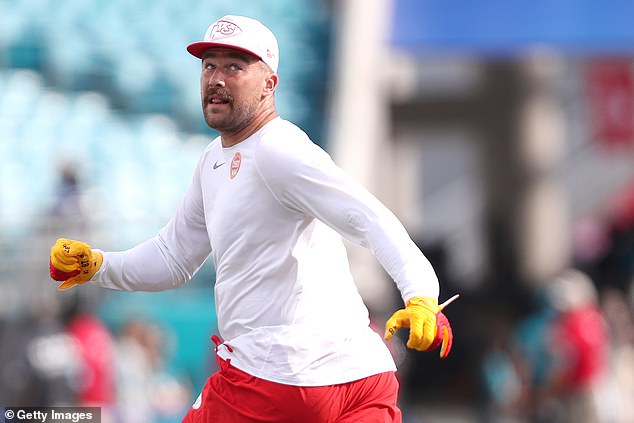 Travis Kelce warms up for a practice game against the Jacksonville Jaguars