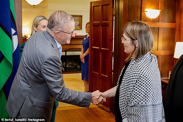 Ms Tuna is the recipient of the 'Local Hero' award for Australian of the Year (Ms Tuna is pictured accepting the award from Prime Minister Anthony Albanese)